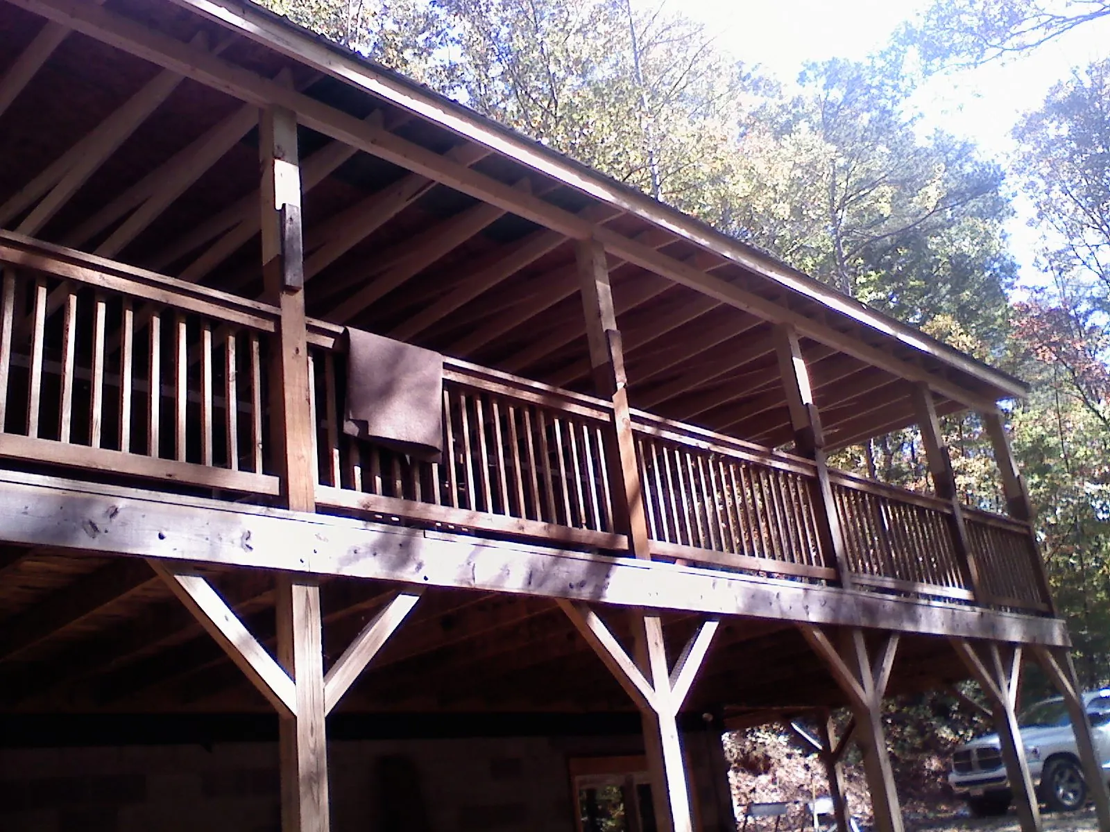 Timber framing under a new elevated porch and deck — Roof Leak Repair in Marthasville by Roofing Brothers